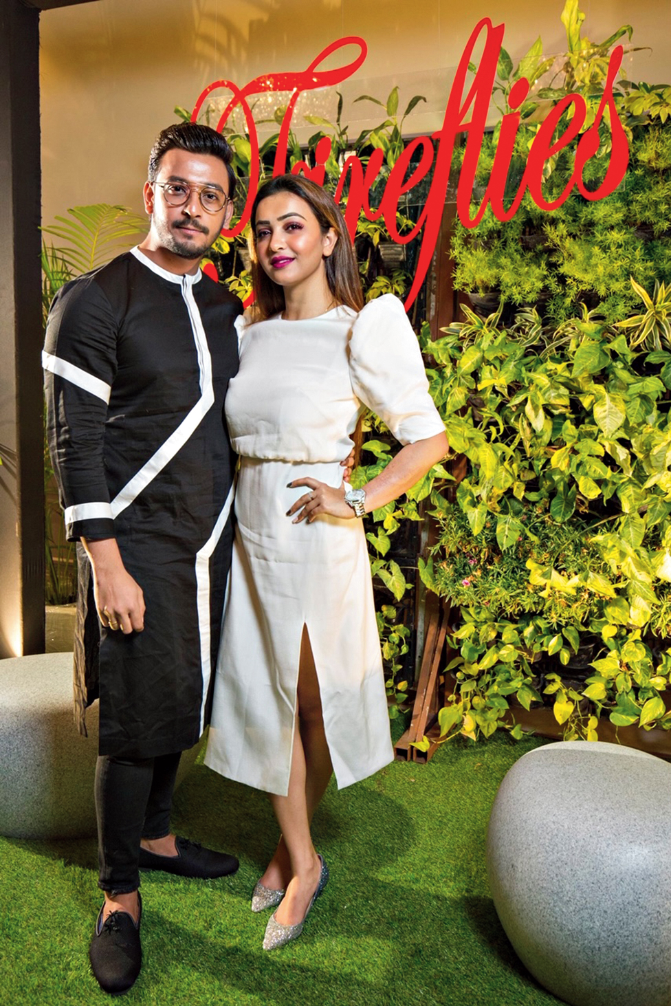 Tolly actors Bonny Sengupta and Koushani Mukherjee turned heads in their black-and-white ensembles from label Amit Nidhi. Bonny wore a black linen kurta designed with white applique work on it and Koushani looked stylish in a white satin dress with puffed shoulders and a slit.