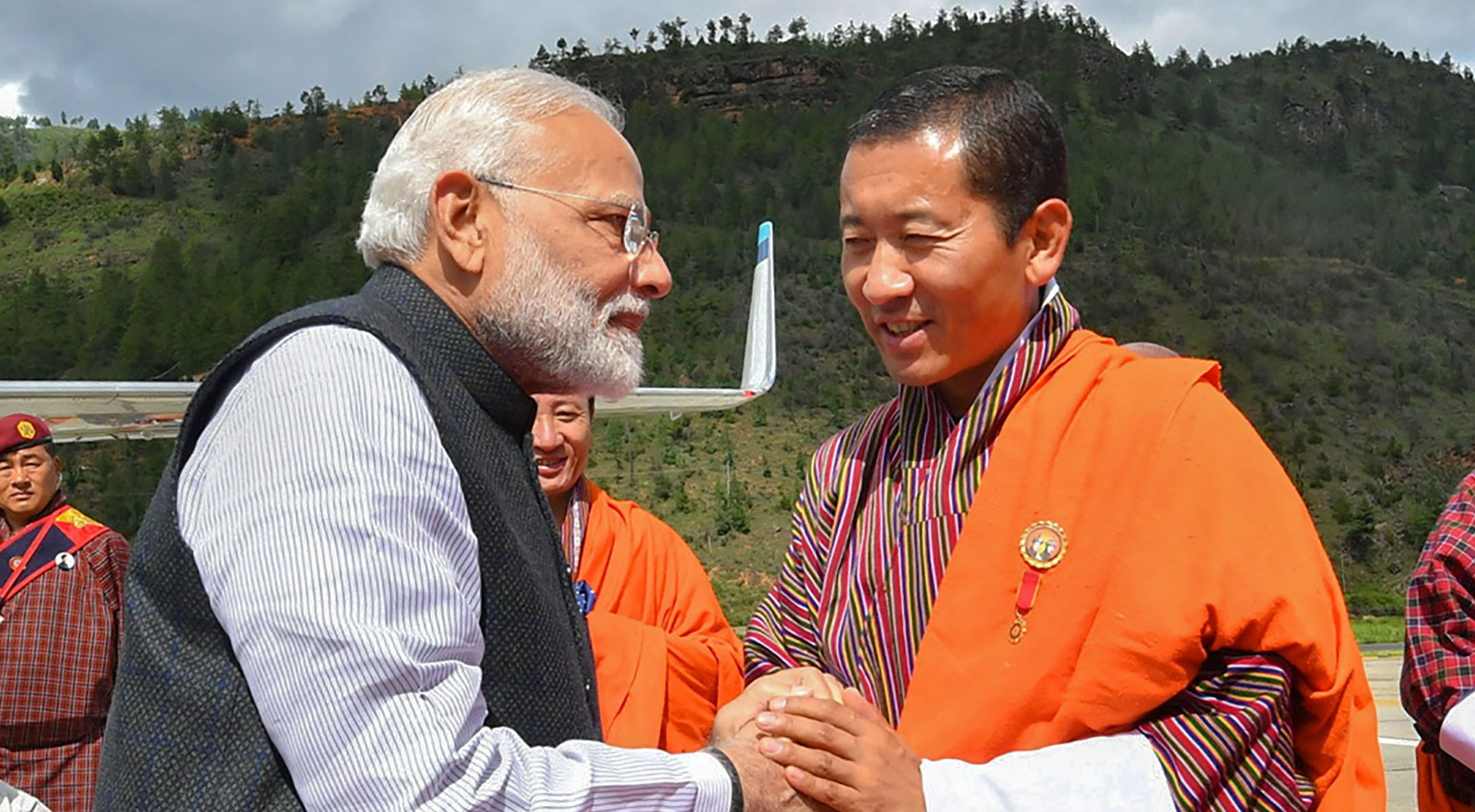 Prime Minister Narendra Modi greeted by dignitaries as he prepares to leave for Delhi, in Thimphu, on August 18, 2019.