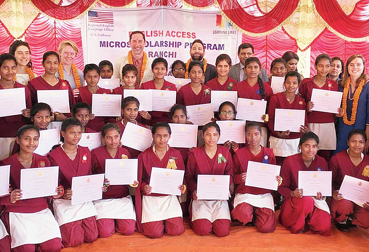 Students of Kasturba Gandhi Balika Vidyalaya show their induction certificates in Khunti on Sunday. 
