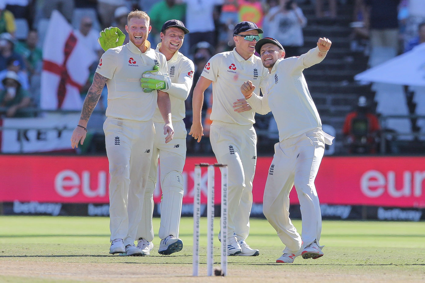 England's player celebrate after defeating South Africa at the Newlands Cricket Stadium in Cape Town, South Africa on Tuesday