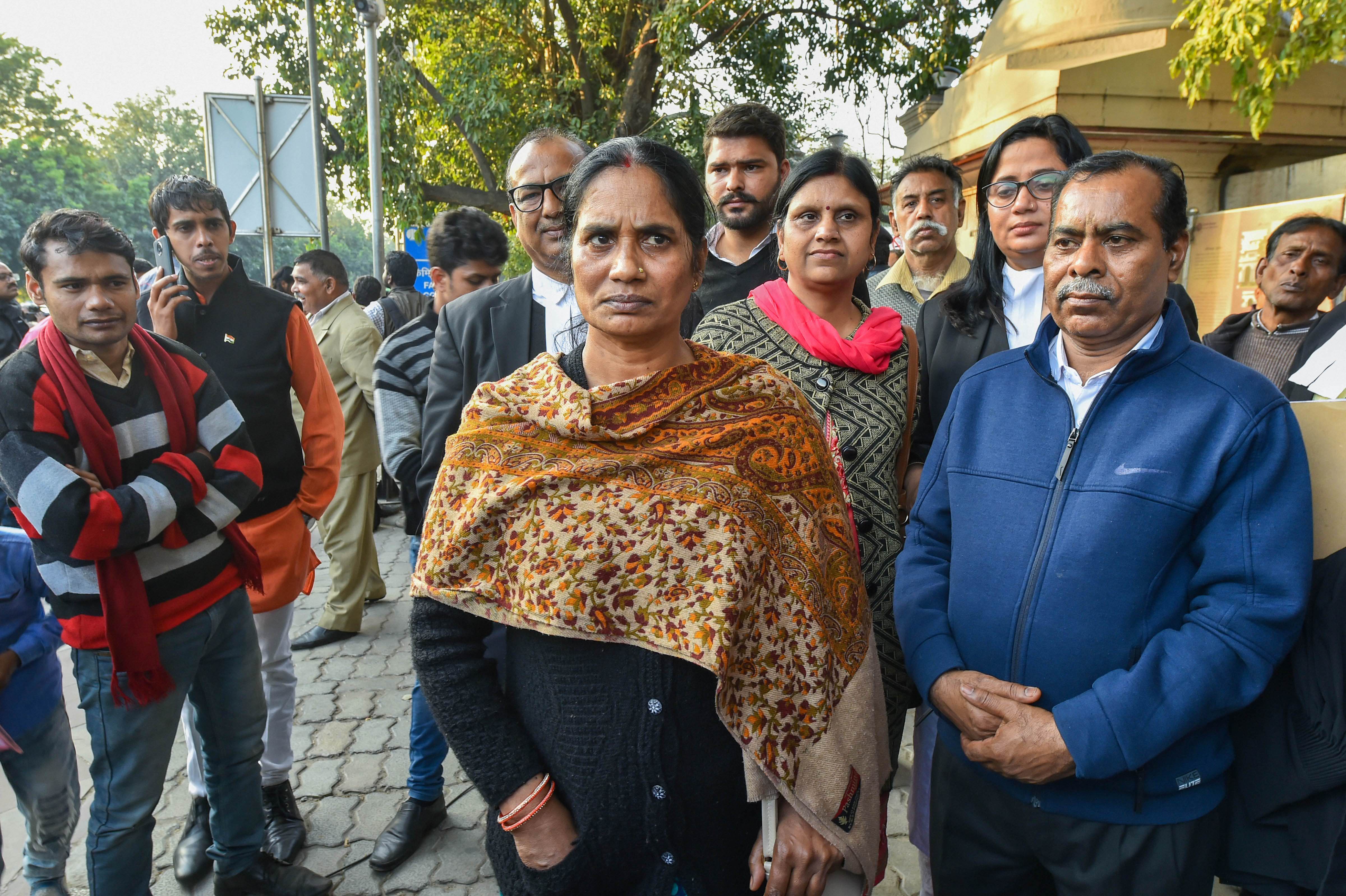 Mother and father of the 2012 rape and murder victim at the Patiala House Court, in New Delhi, Thursday, February 13, 2020.