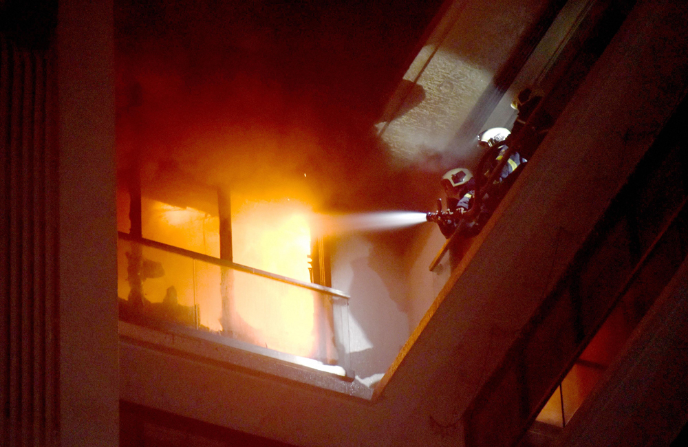 Fire tenders attempt to douse a fire at Rath Shrivalli in Vile Parle (W) in Mumbai on December 22