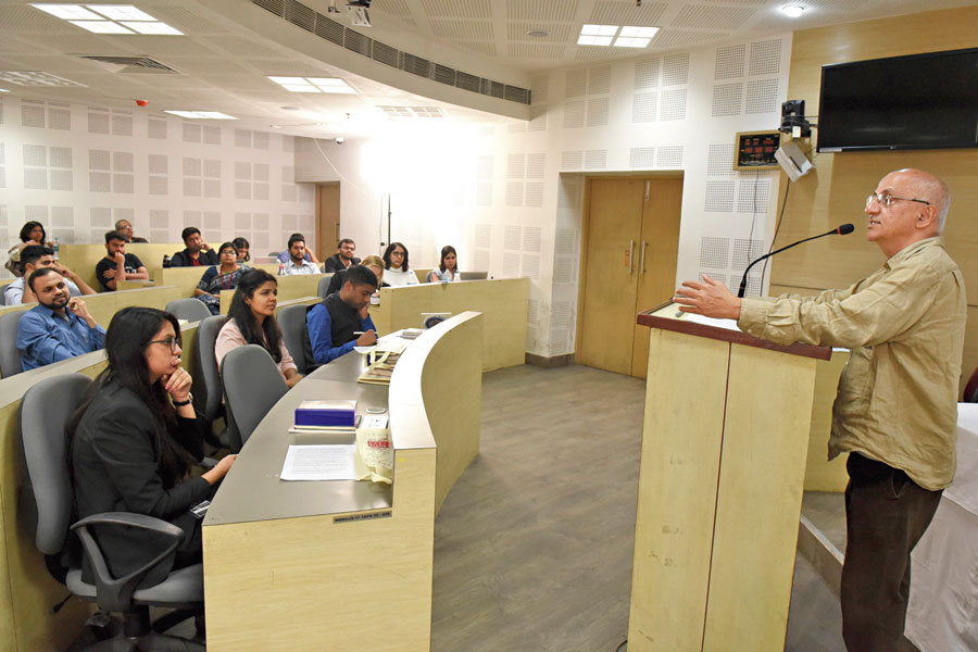 Social activist Harsh Mander speaks to participants in a conference at NUJS on Saturday. 
