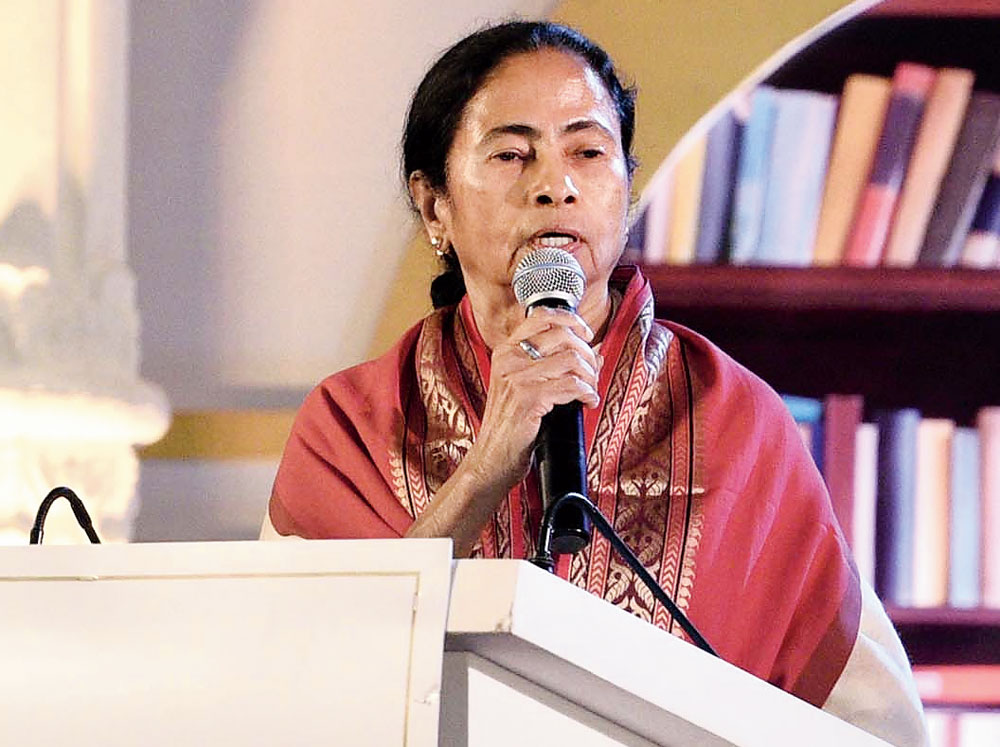 Mamata Banerjee at the Calcutta University convocation at Nazrul Mancha on Monday. 

