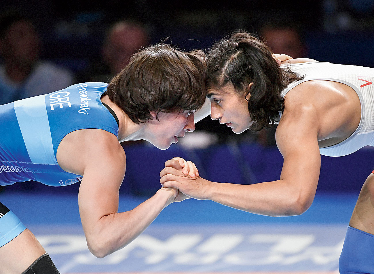 Vinesh (right) and Maria Prevolaraki during the bronze-medal match on Wednesday. 