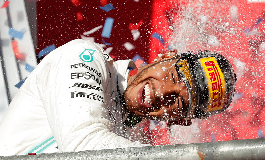 Mercedes driver Lewis Hamilton, of Britain, celebrates following the Formula One US Grand Prix auto race at the Circuit of the Americas, Sunday, November 3, 2019, in Austin, Texas.