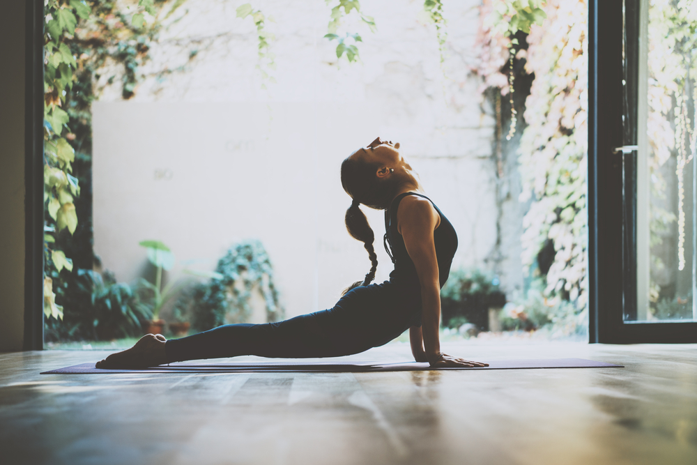 Check out some exercise videos on YouTube, or just put on music and dance. Combine it with a 30 minute yoga session, three times a week.