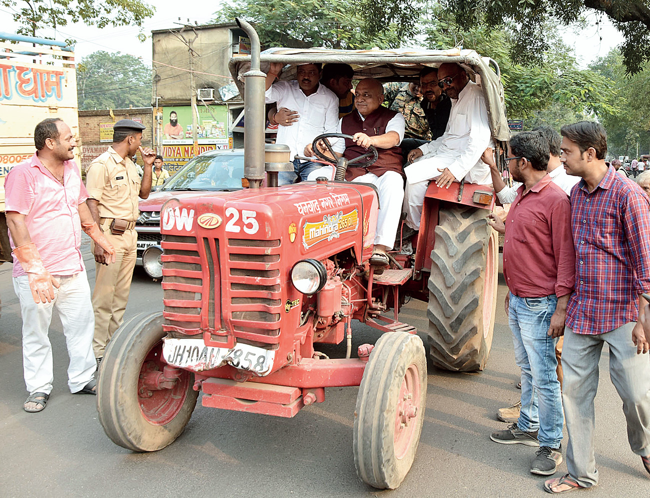 In driver’s seat: Mayor Chandrashekhar Agarwal steers a garbage tractor in Dhanbad on Tuesday.
