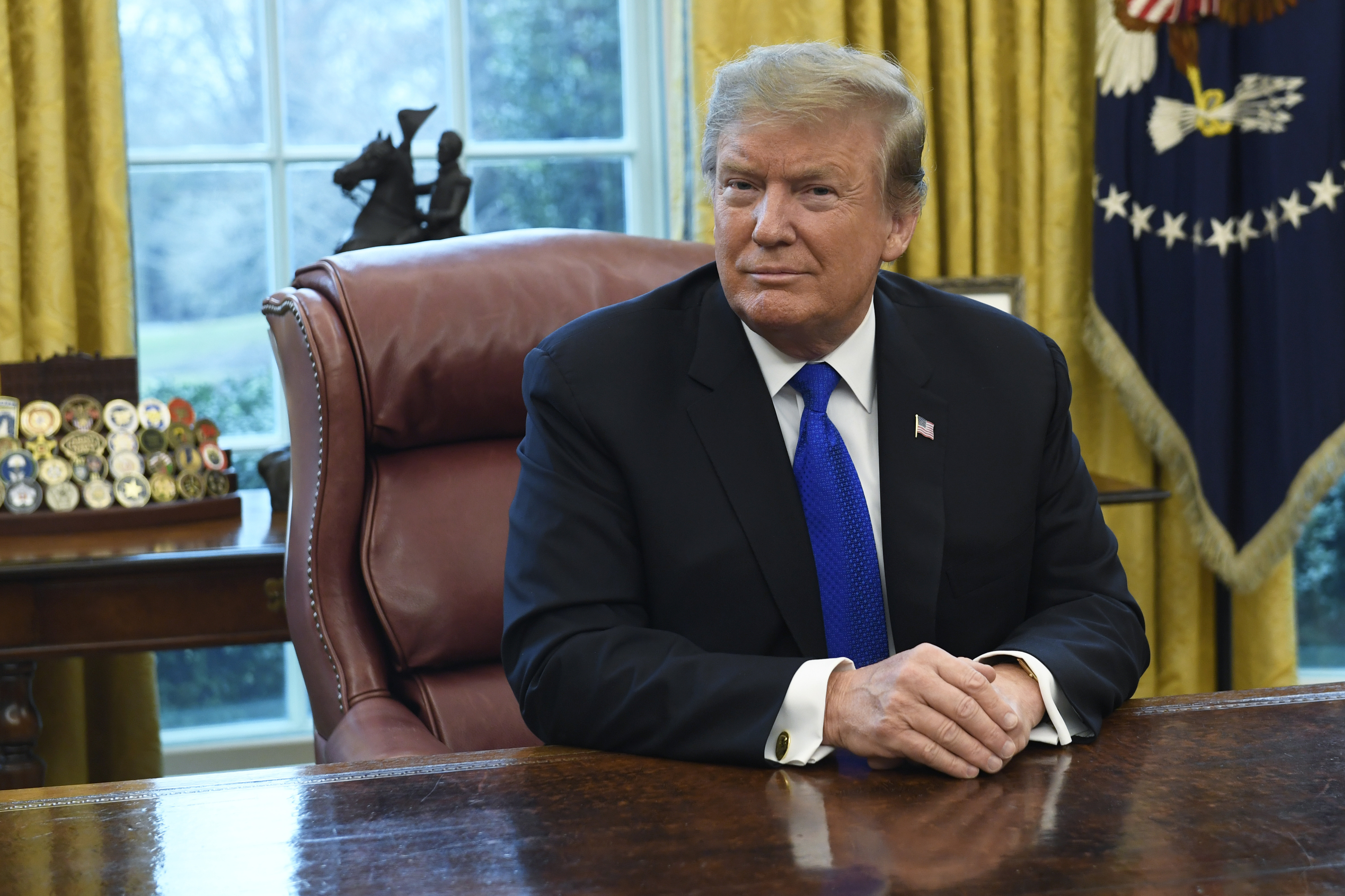 President Donald Trump listens during his meeting with Chinese Vice-Premier Liu He in the Oval Office of the White House in Washington on Friday.