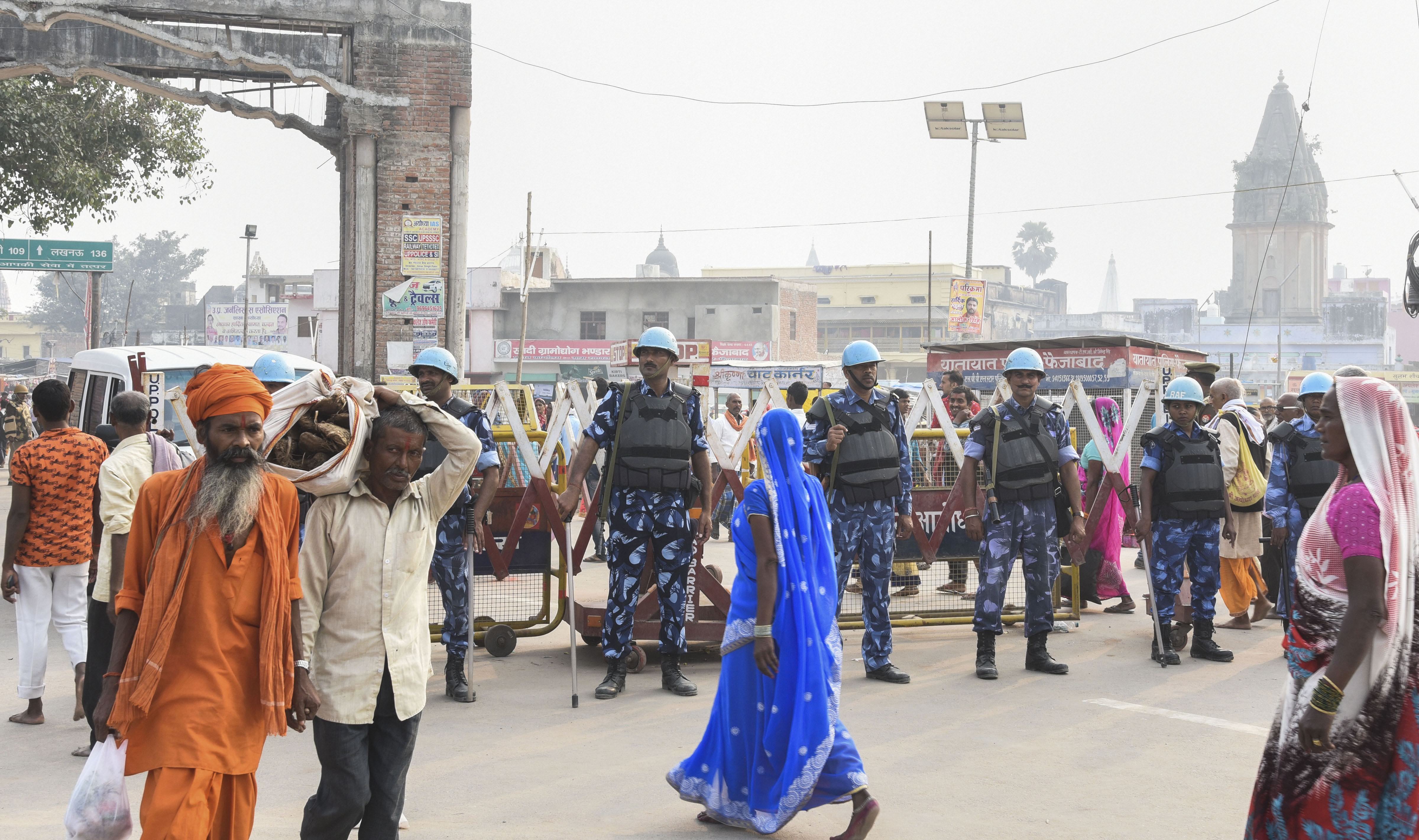 Police personnel stand guard at Naya Ghat in Ayodhya on November 7. The Centre dispatched 4,000 paramilitary personnel to Uttar Pradesh ahead of verdict on the Ayodhya land case.