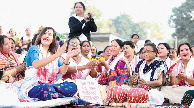 Women perform naam prasanga during a demonstration against the citizenship act in Demow on Saturday.