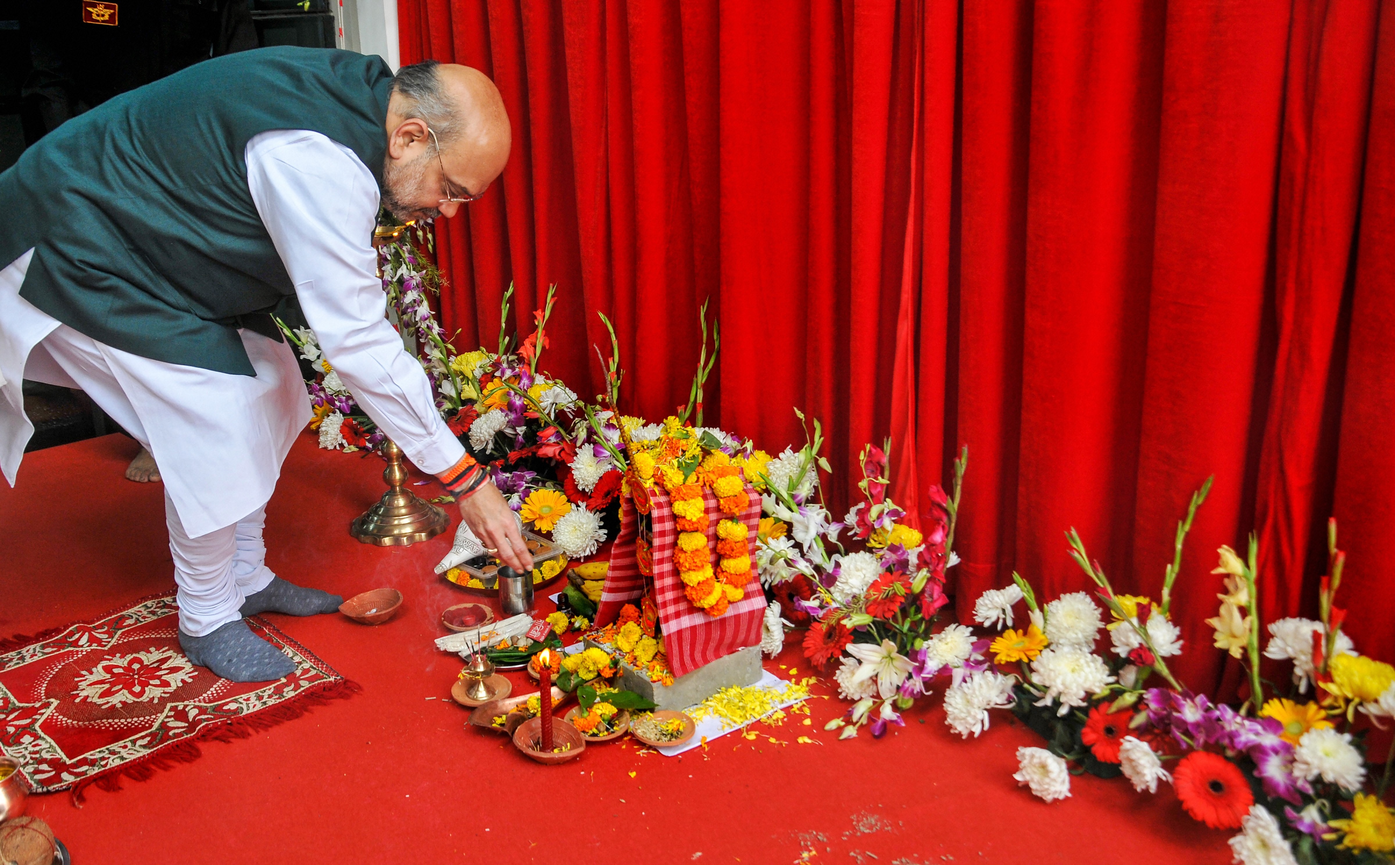 Union home minister Amit Shah offers prayers during the inauguration of 29 Special Composite Group complex of National Security Guard (NSG), at Rajarhut on the outskirts of Kolkata, Sunday, March. 1, 2020