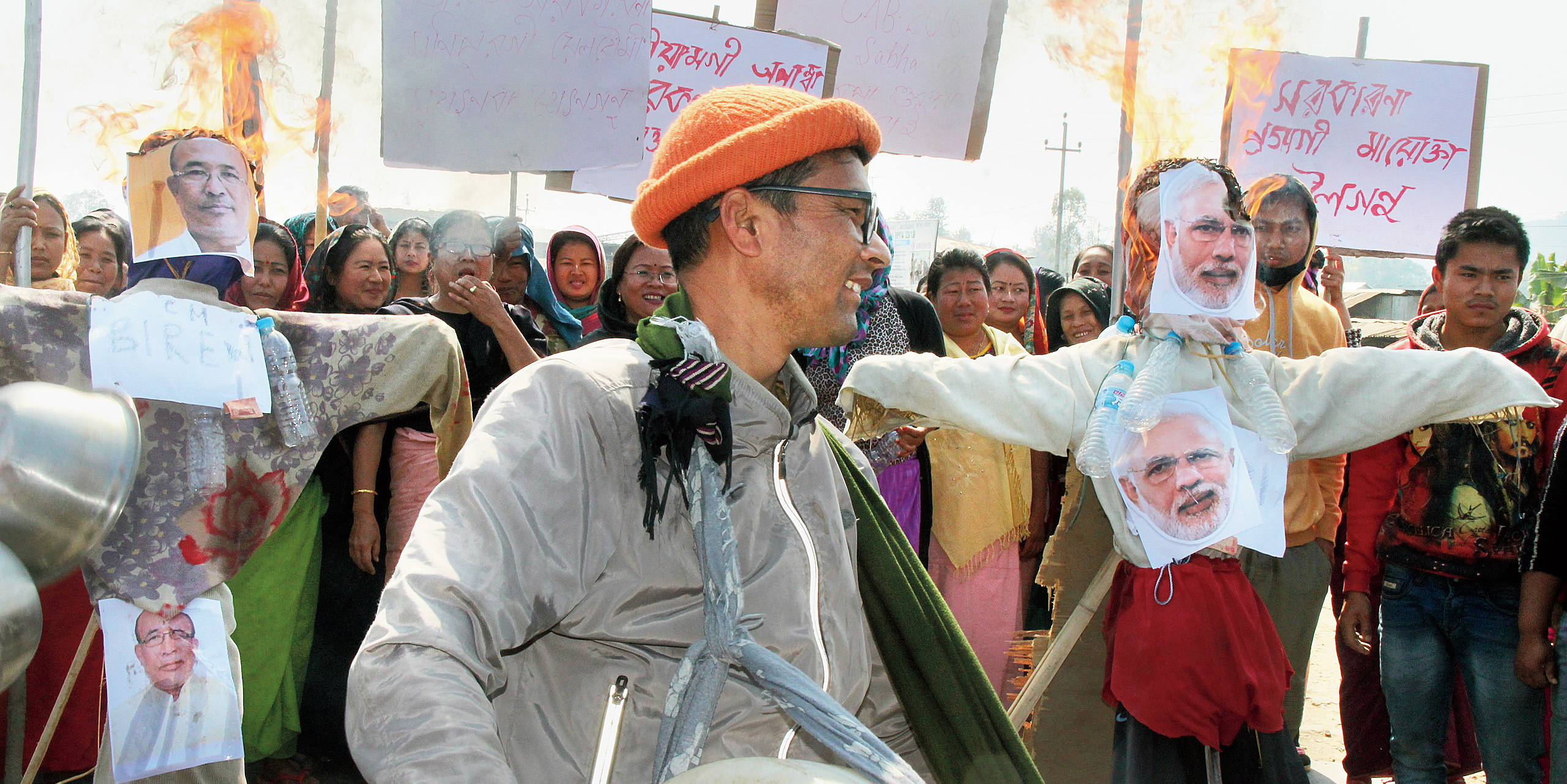 Protesters burn effigies of Prime Minister Narendra Modi and Manipur chief minister Biren Singh in Imphal on Tuesday. 