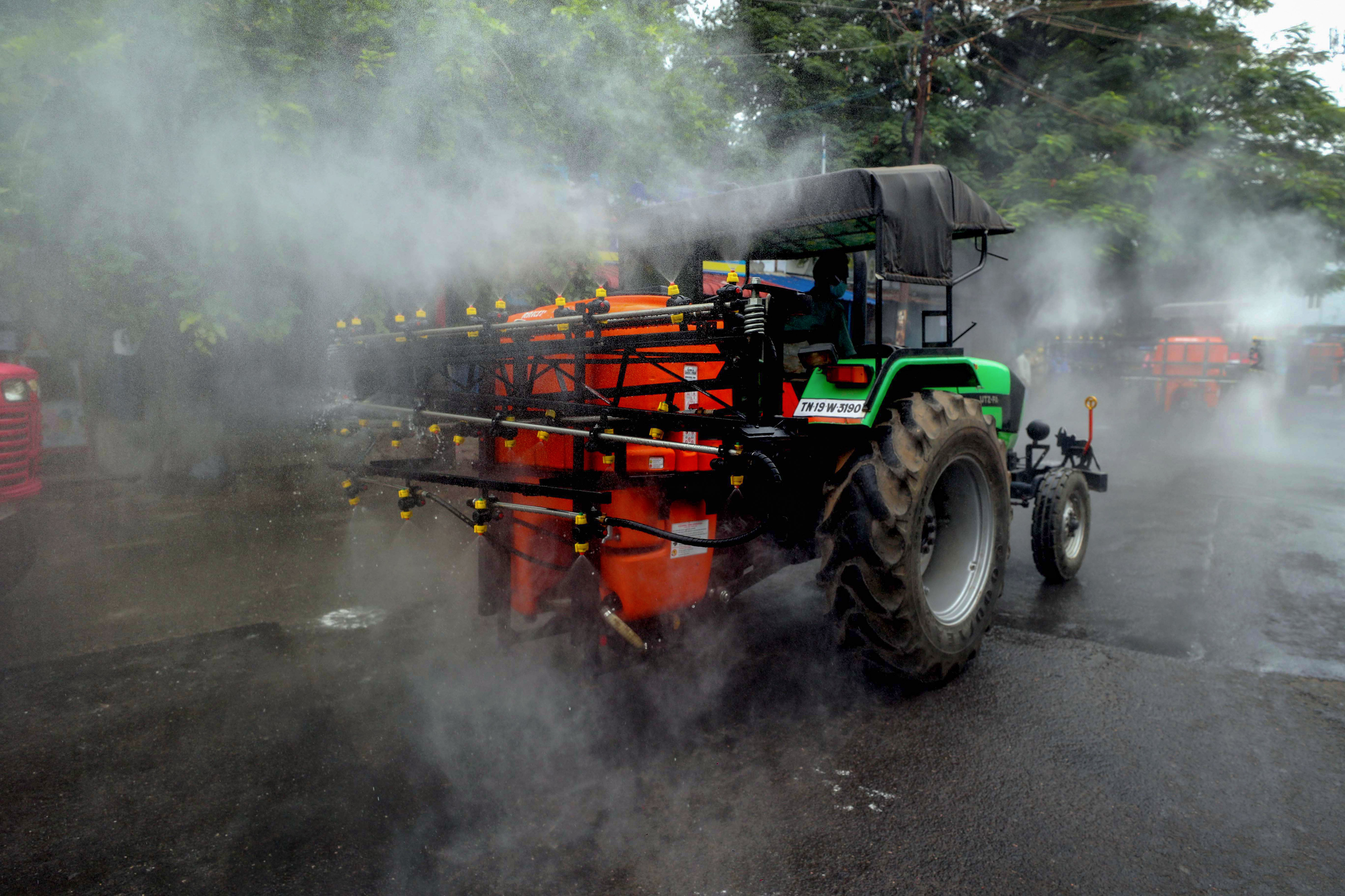 Municipal corporation workers sanitise a residential area in an effort to limit the spread of coronovirus, during the nationwide lockdown, in Coimbatore, Tuesday, April 7, 2020