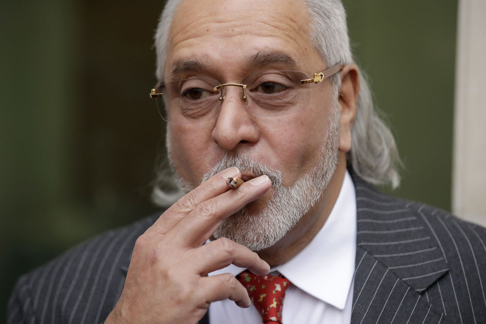 Vijay Mallya speaks to the media as he takes a break outside Westminster Magistrates Court in London on Monday, December 10, 2018