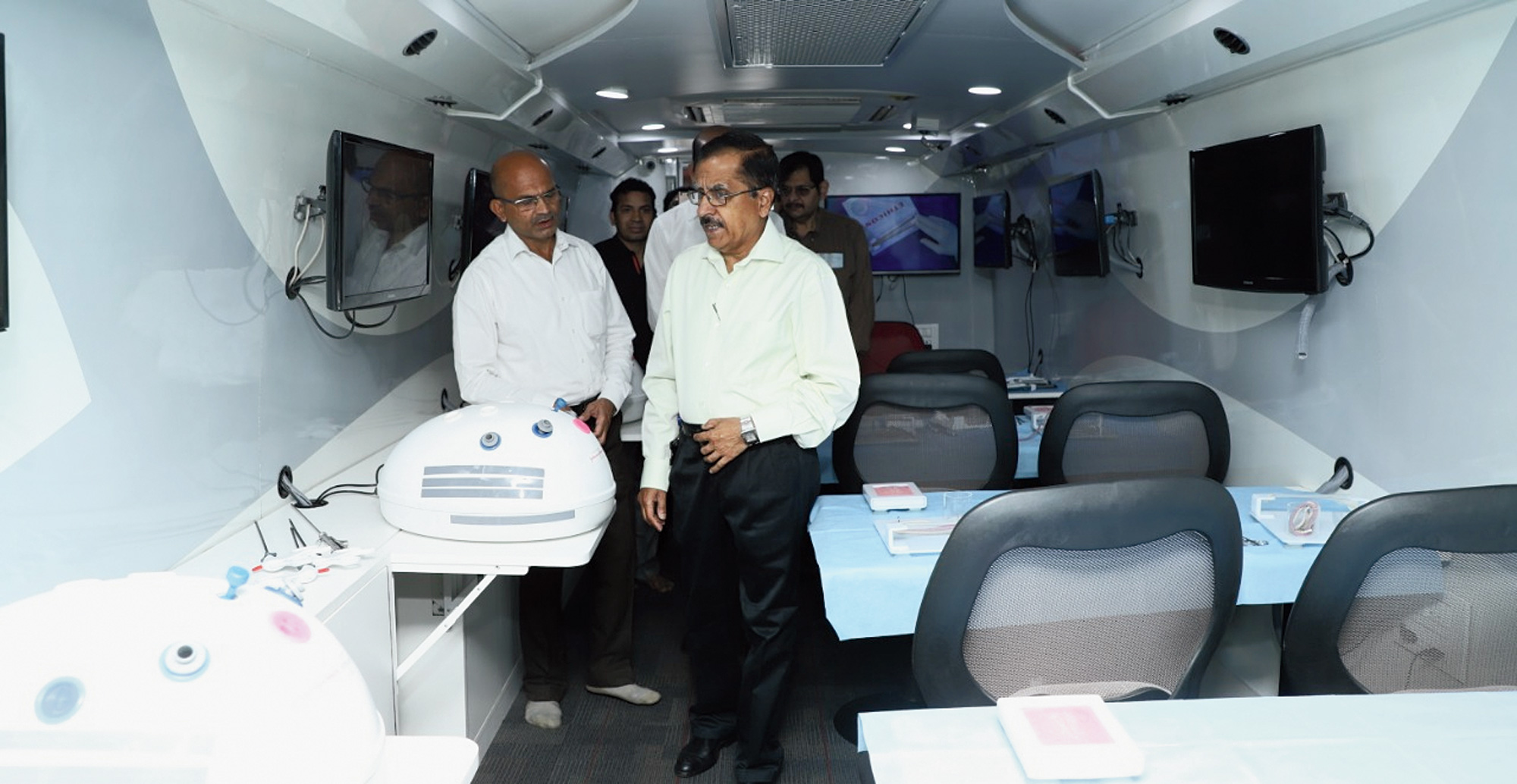 Tata Steel medical services GM Rajan Chaudhry (right) inside the bus on Saturday. 