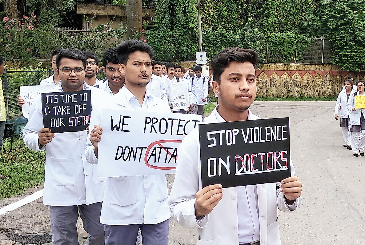 Interns, postgraduate doctors and medical students take part in a protest rally in Agartala on Friday.