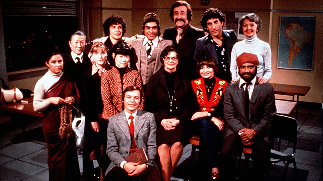 Jeremy Brown sits for a class photograph in Mind Your Language