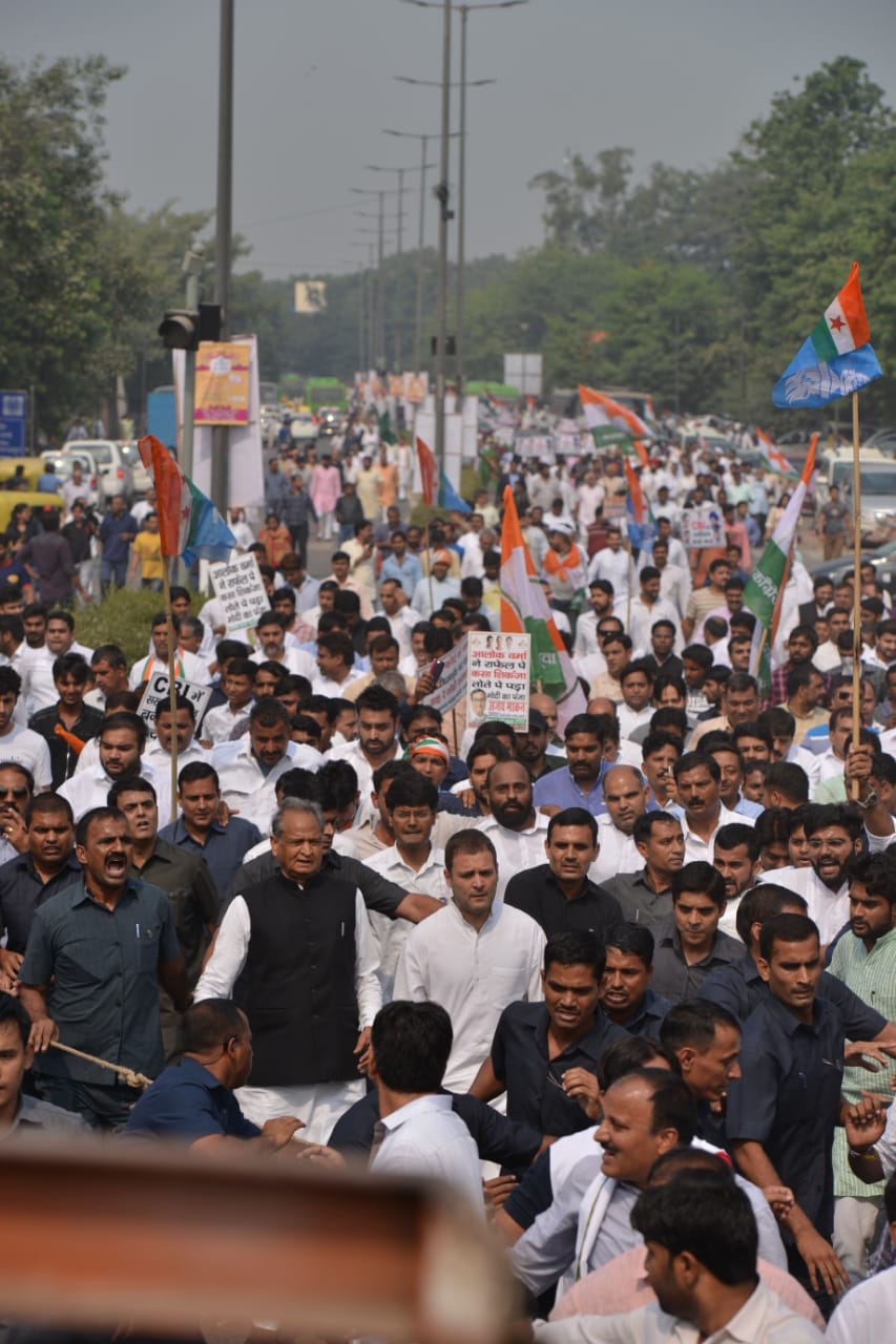 Congress members and workers led by Rahul Gandhi march up to CBI headquarters in New Delhi on Friday