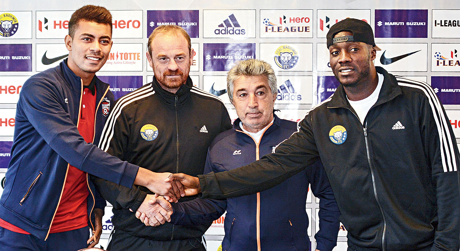 Real Kashmir captain Loveday Enyinnaya (extreme right) and coach David Robertson (second from left) with Churchill Brothers captain Eldor Hussain (extreme left) and coach Petre Gigiu, in Srinagar on Monday. 