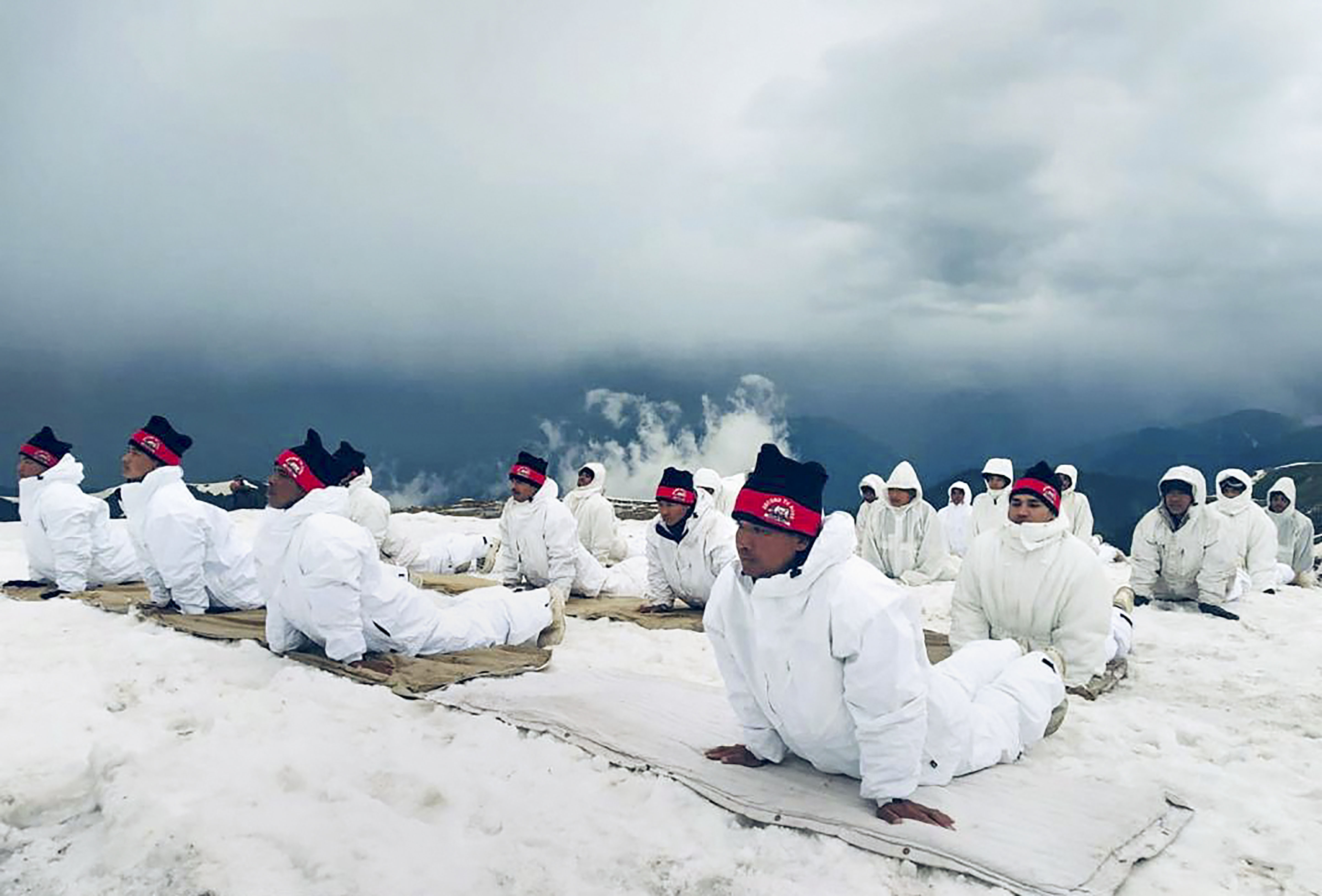  Indian Army personnel on International Day of Yoga in the icy ranges of the Himalayas on June 21.
