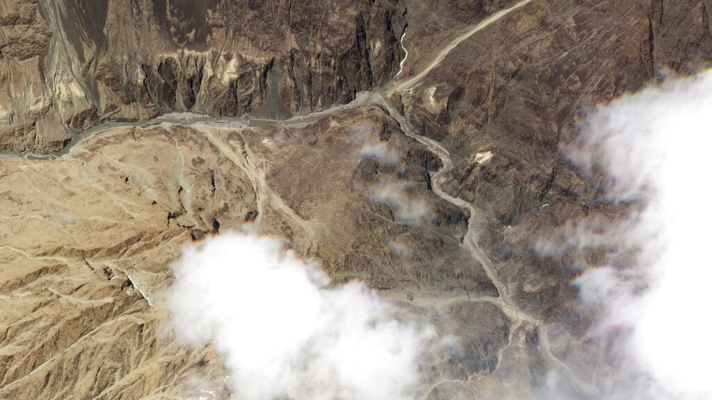 This June 18, 2020, satellite photo released by Planet Labs, shows the reported site of a fatal clash between Indian and Chinese troops in the Galwan River Valley in the Ladakh region near the Line of Actual Control, BKalong their disputed border high in the Himalayas. 