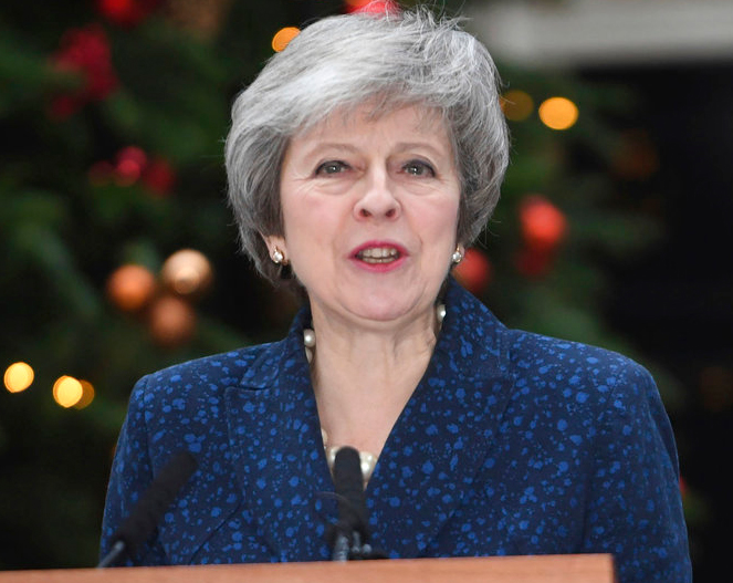 Britain's Prime Minister Theresa May makes a media statement in Downing Street, London, on Wednesday, confirming there will be a vote of confidence in her leadership of the Conservative Party.