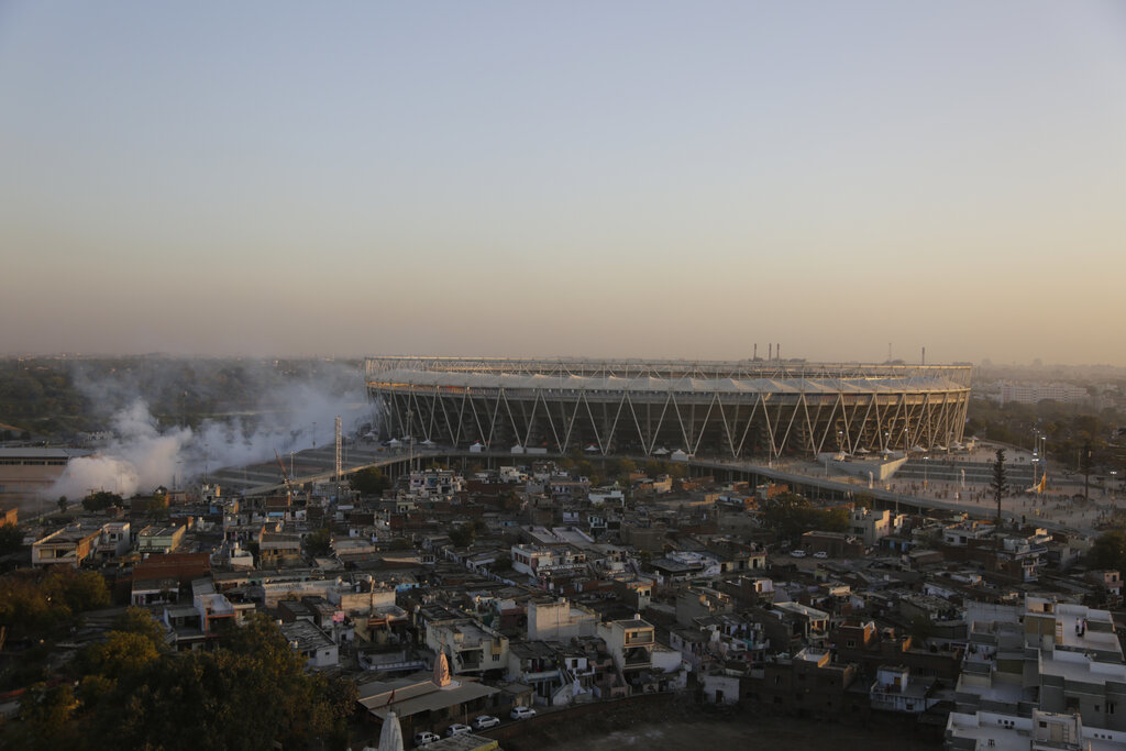 Smoke from a pest fumigation rises from the newly constructed Sardar Patel Gujarat Stadium that U.S. President Donald Trump will be visiting, in Ahmedabad