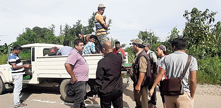 KSU activists along with Meghalaya police personnel conduct checks in East Jaintia Hills on Saturday. 