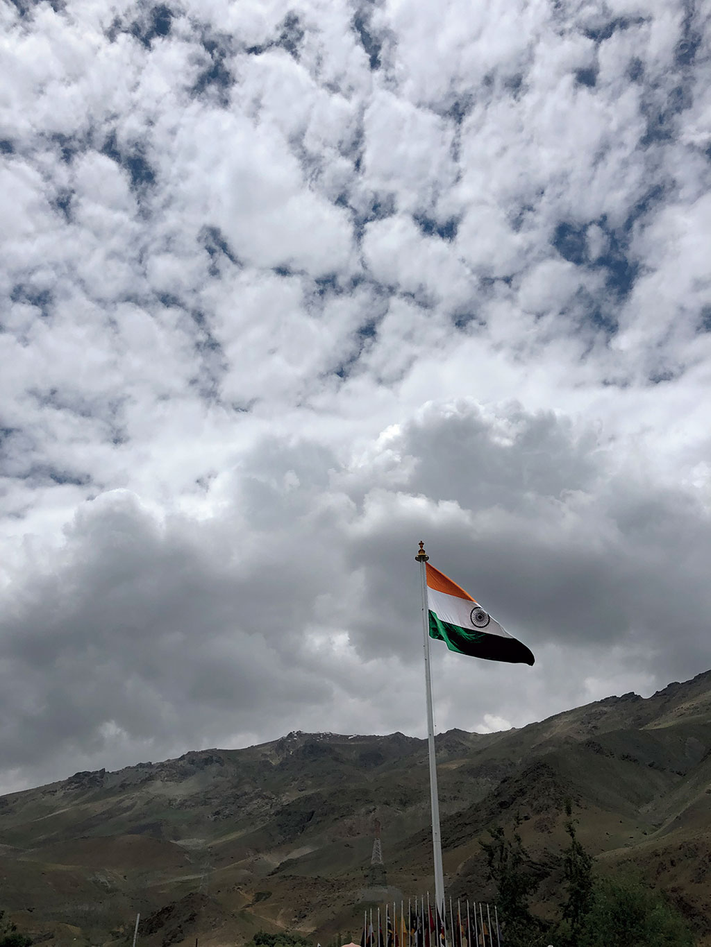 The craggy slope that was once a blistered battlefront, taken by the to and fro of artillery gunfire, is now a grand red sandstone memorial to soldiers. It is looked over by the Tricolour said to weigh 15 kilograms.
