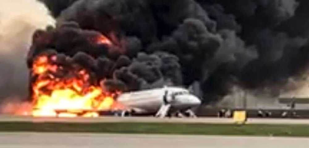 The plane that caught fire in Moscow on May 5, 2019. Some survivors of the air crash had actually paused to gather their possessions before fleeing the wreckage