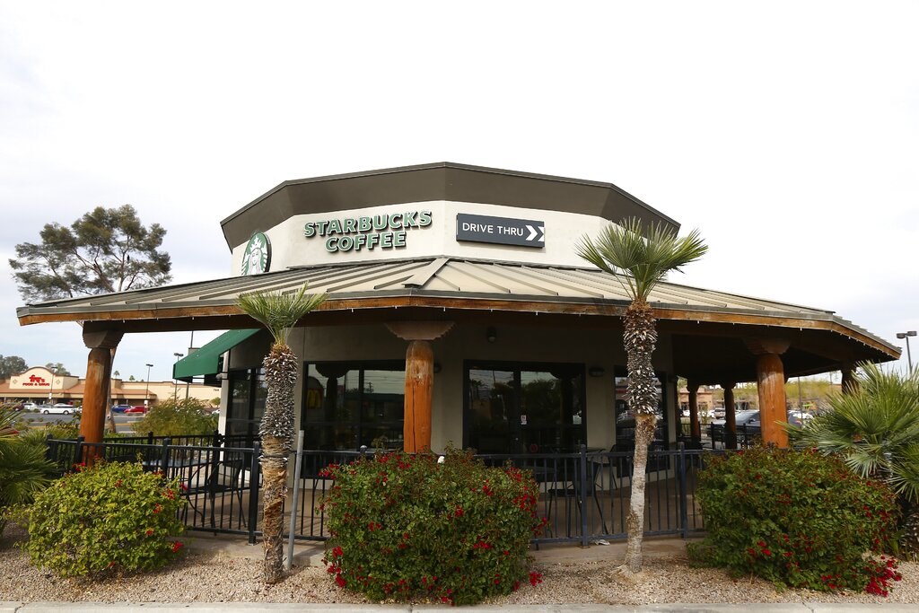 A Starbucks Community Store, which offers customers the usual Starbucks products along with a large space for community meetings and programs, in Phoenix. The Seattle-based company plans to open or remodel 85 stores by 2025 in rural and urban communities across the U.S. That will bring to 100 the total number of community stores Starbucks has opened since it announced the program in 2015.