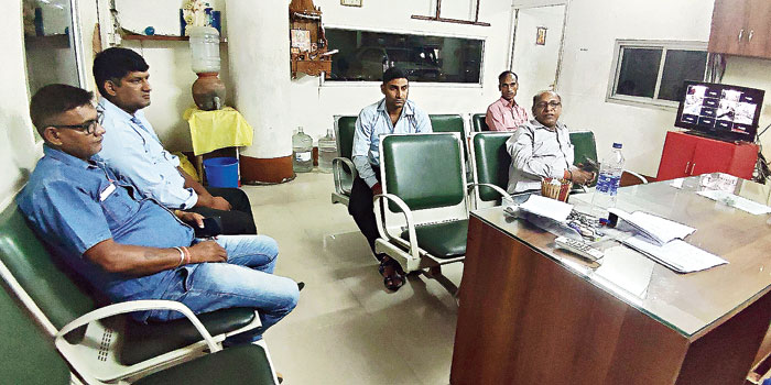 Employees of Mahesh Sunny Pvt Ltd, who came from Delhi but were not allowed to work, at the airport’s parking bay office