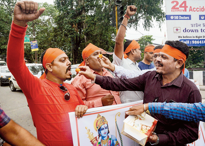 Activists celebrate the Supreme Court verdict in the Ayodhya case in Guwahati on Saturday