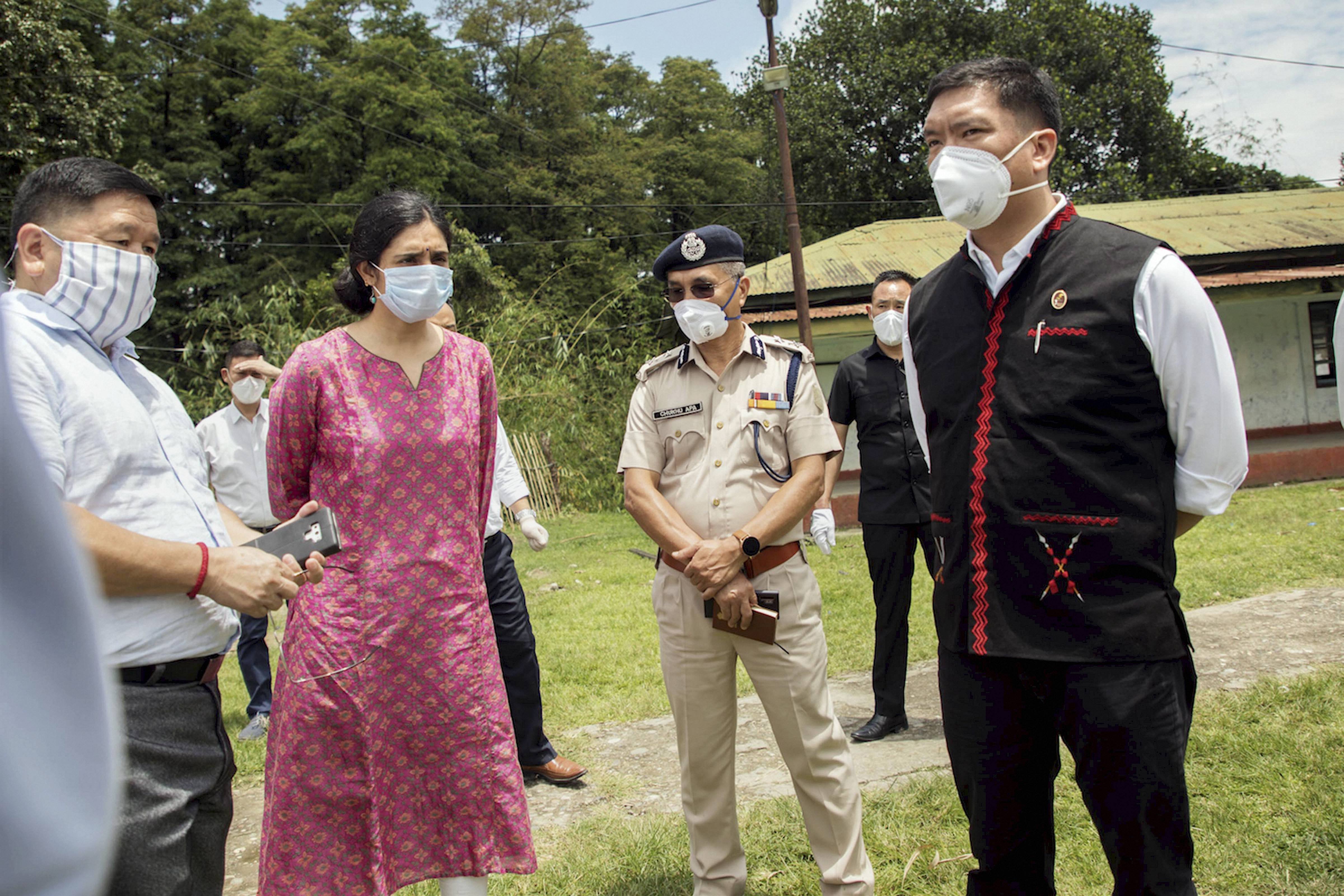 Arunachal Pradesh Chief Minister Pema Khandu interacts with officials during an inspection of a quarantine facility for COVID-19 patients, at Police Training Centre in Banderdewa, 30 km away from Itanagar, Tuesday, May 5, 2020.