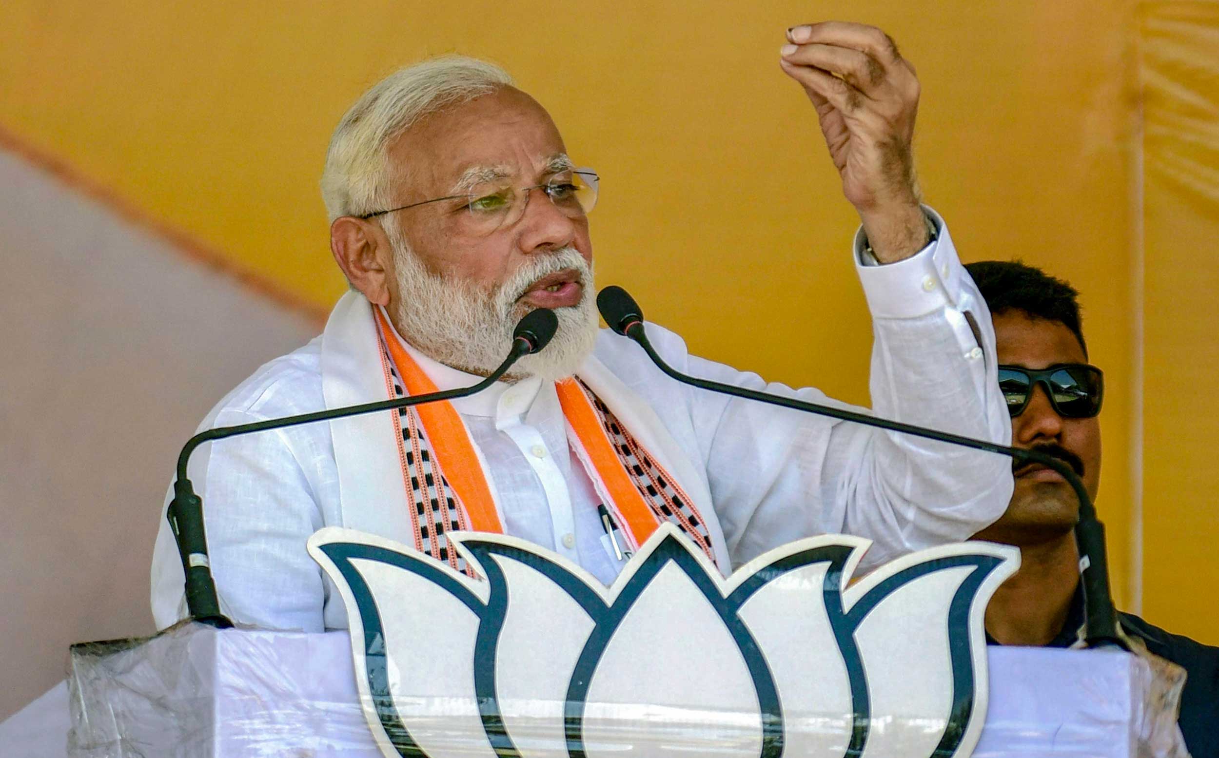 Prime Minister Narendra Modi addresses an election rally for the Lok Sabha polls, at Bharwari in Kaushambi district, on May 1, 2019. 