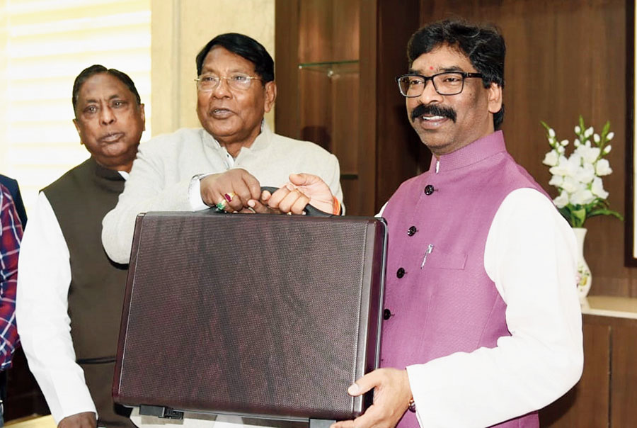 CM Hemant Soren and finance minister Rameshwar Oraon with the budget briefcase in Ranchi on Tuesday. 