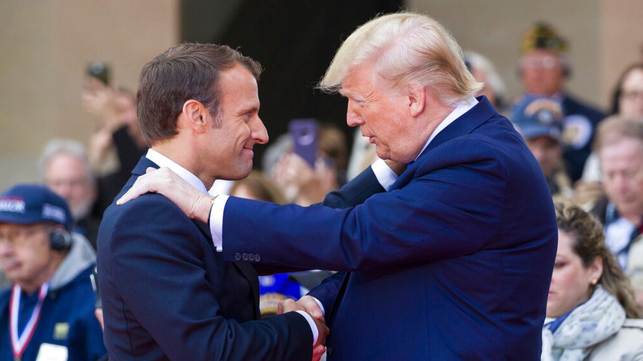 File photo of French President Emmanuel Macron and American President Donald Trump as they speak during a ceremony to commemorate the 75th anniversary of D-Day at the American Normandy cemetery