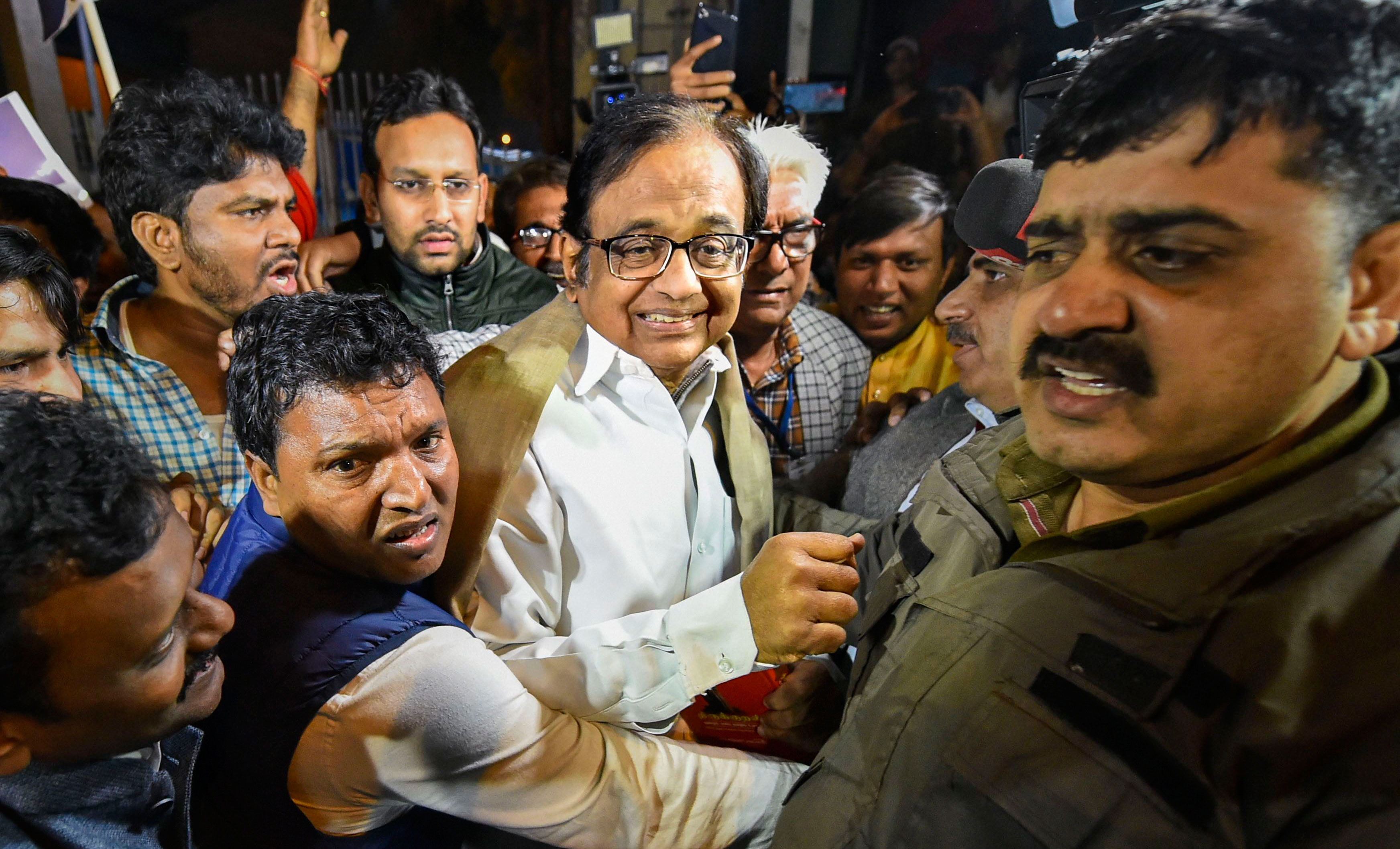 Chidambaram surrounded by party workers as he is released from Tihar Jail on December 4, 2019.