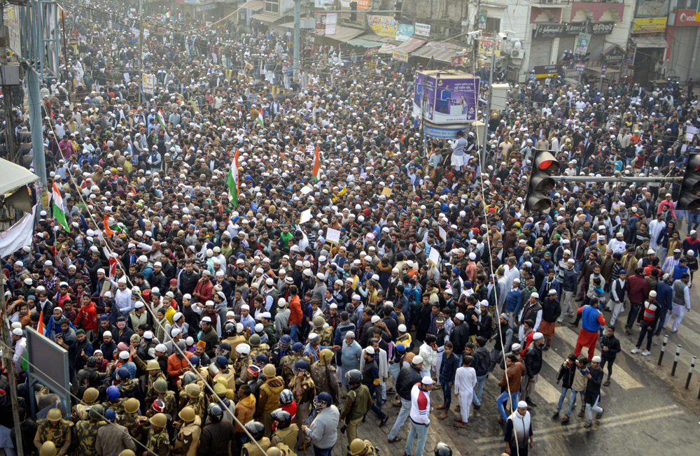 Protesters participate in a rally against the Citizenship Act, in Kanpur, Friday, December 20, 2019.