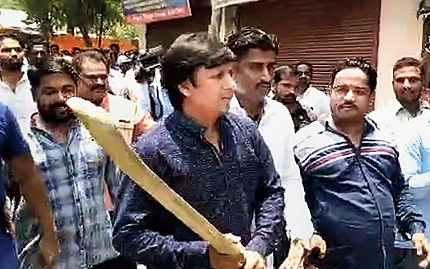 Footage shows Akash wielding the bat during a civic demolition drive in Indore on Wednesday