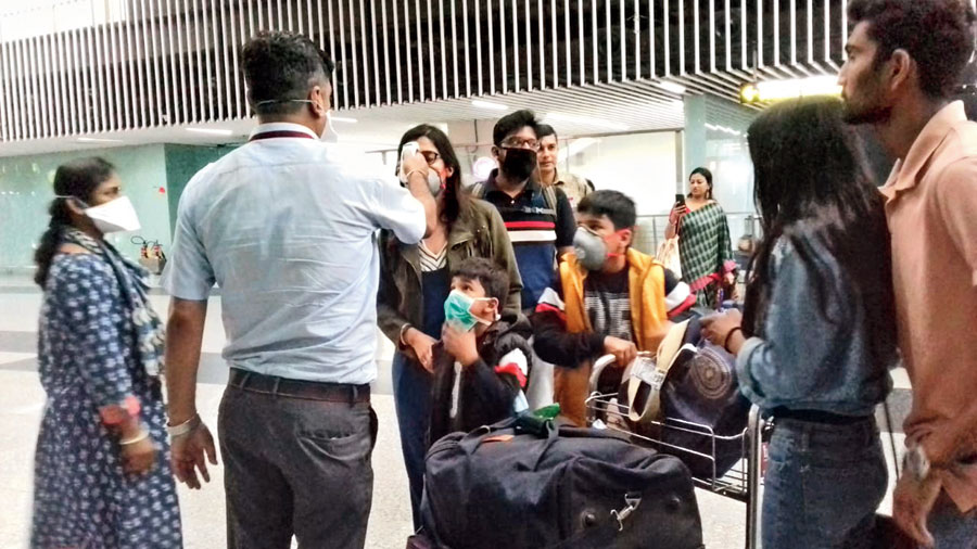 Health screening of domestic passengers at the airport on Tuesday
