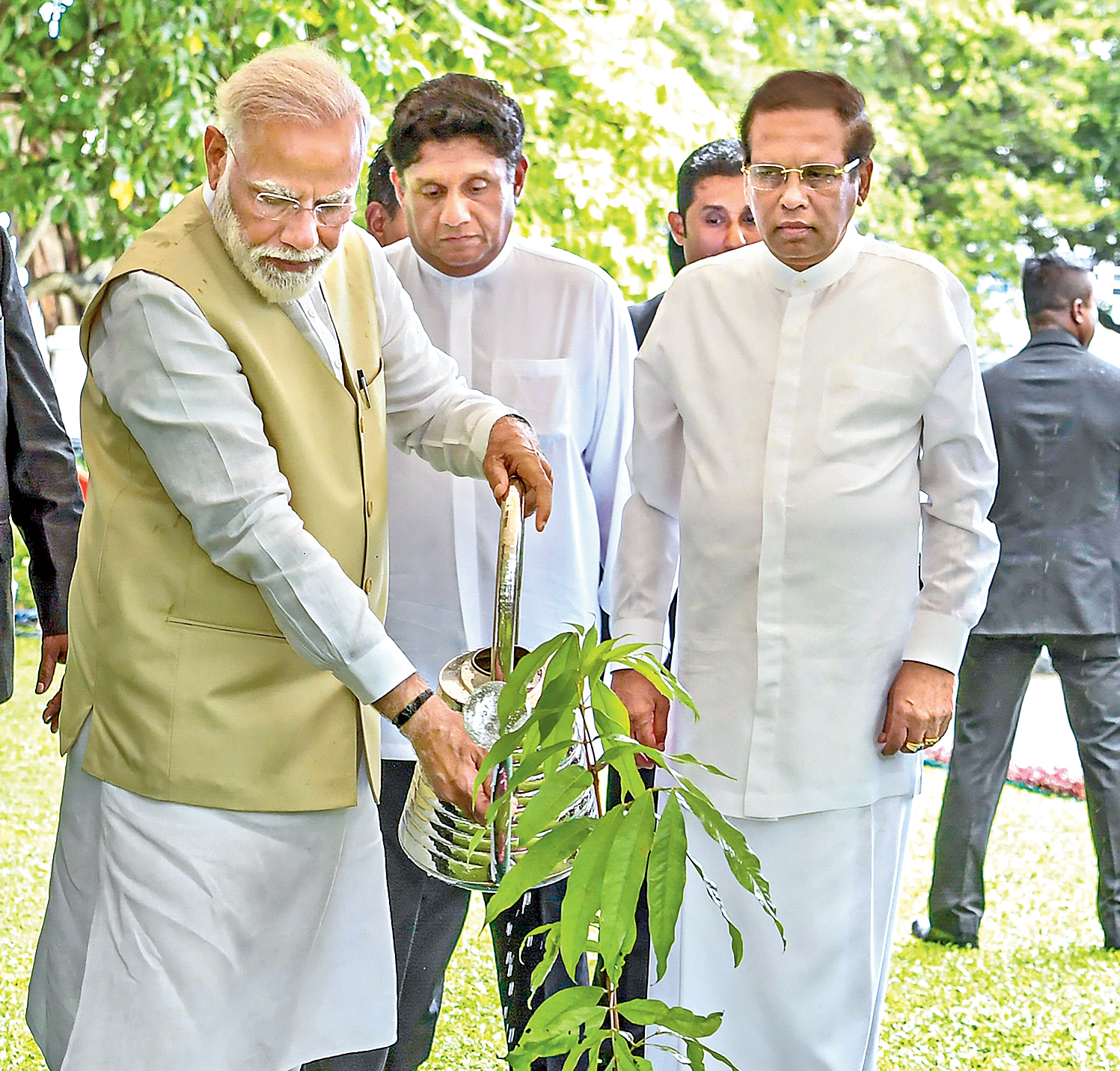 Prime Minister Narendra Modi plants an Ashoka tree at the President’s House in Colombo, Sri Lanka, on Sunday as President Maithripala Sirisena looks on. 
“Deep roots. Strong relationship…,” external affairs ministry spokesperson Raveesh Kumar tweeted. 
A plaque near the sapling read “Asoka Saraca asoca”. 
In the Ramayana, Sita was held captive in an Ashoka garden in Lanka after she was abducted by Ravan. Sita chose to stay under an Ashoka tree, where Hanuman met her for the first time.