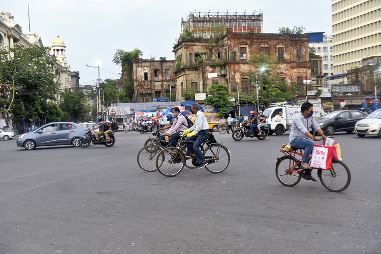The good old bicycle — neither encouraged nor a familiar sight in the heart of the city, certainly not during the evening peak hour —  was a lifeline for many. Picture shows riders at Esplanade at 5.30pm on Monday. Cycles are banned on thoroughfares in this part of the city between 7am and 11pm. However, police are not prosecuting bicyclists now to ensure people can reach their destination in the absence of other modes of transport.