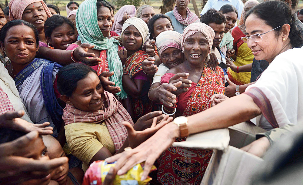Mamata Banerjee with tribal groups