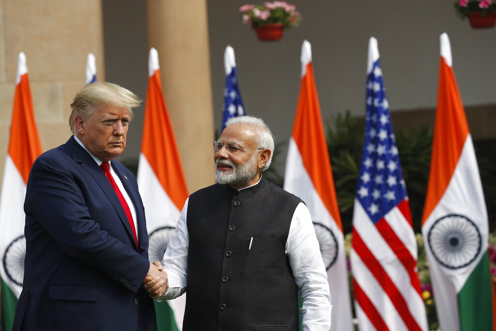 US President Donald Trump and Indian Prime Minister Narendra Modi shake hands before their meeting at Hyderabad House in New Delhi