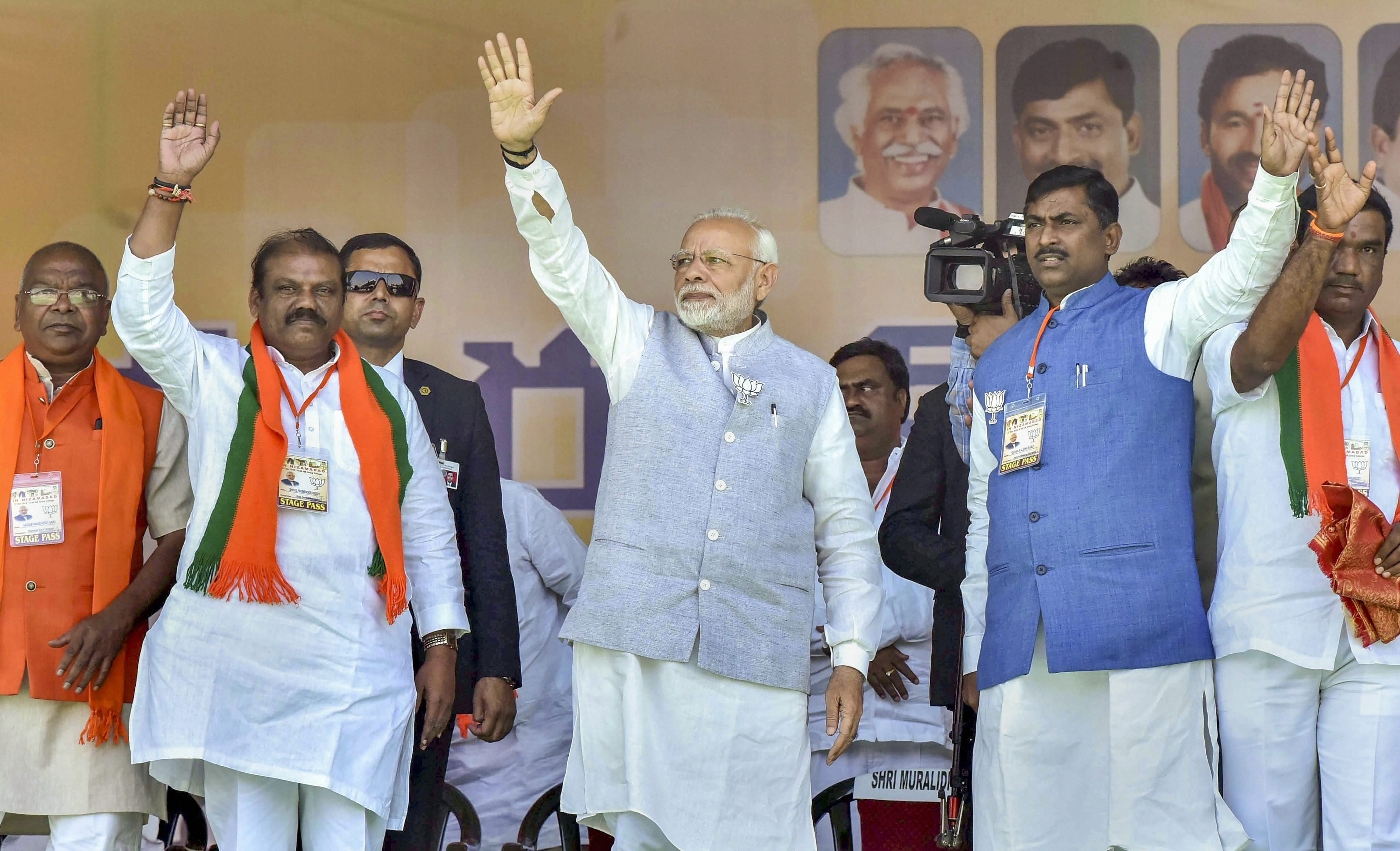 Narendra Modi at an election rally ahead of the Telangana Assembly Elections in Nizamabad.
