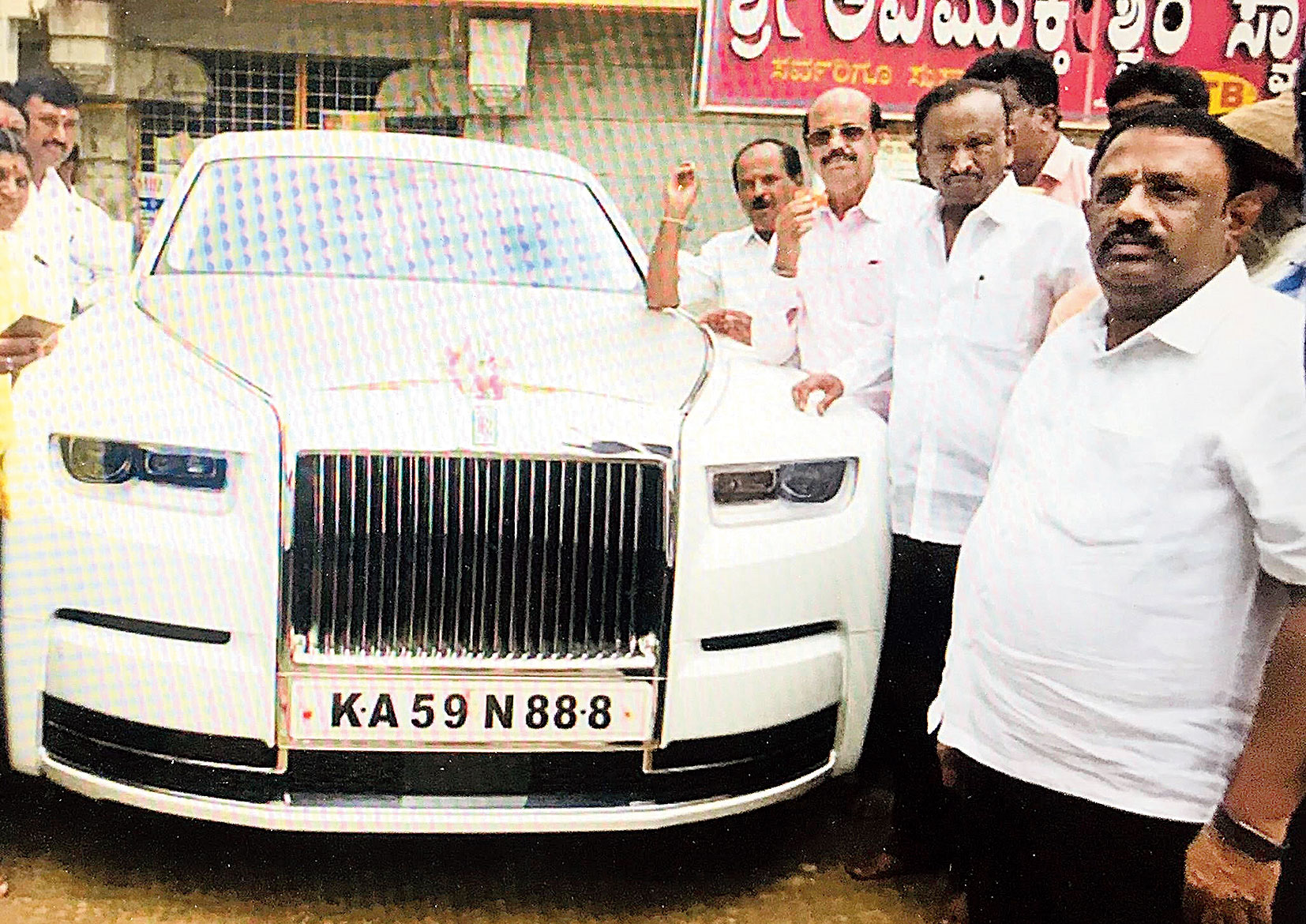 MTB Nagaraj (first from right touching the car) with his Rolls-Royce Phantom VIII outside the Sree Avimukteshwara Temple at Hoskote near Bangalore recently