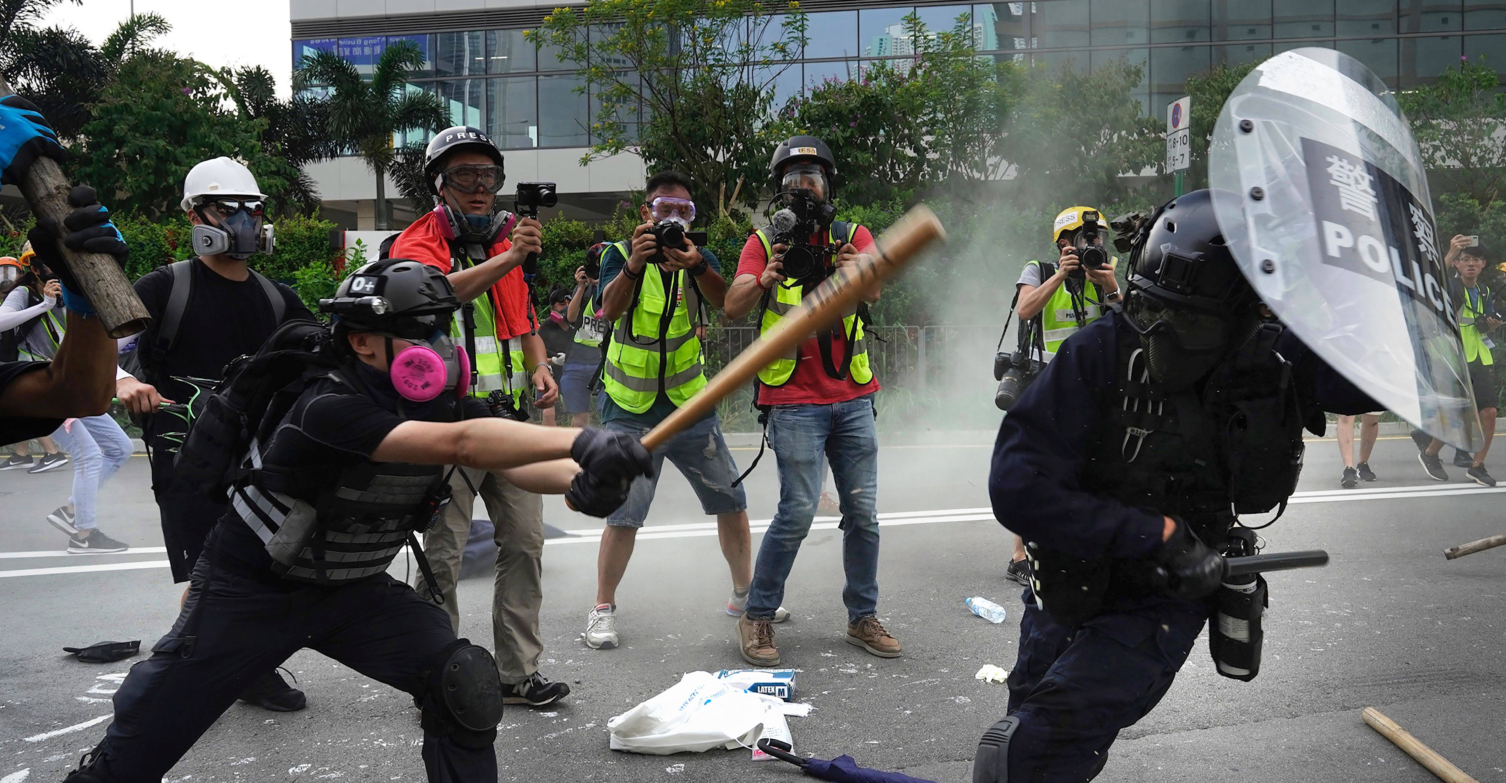 Police and demonstrators clash during a protest in Hong Kong on August 24, 2019.