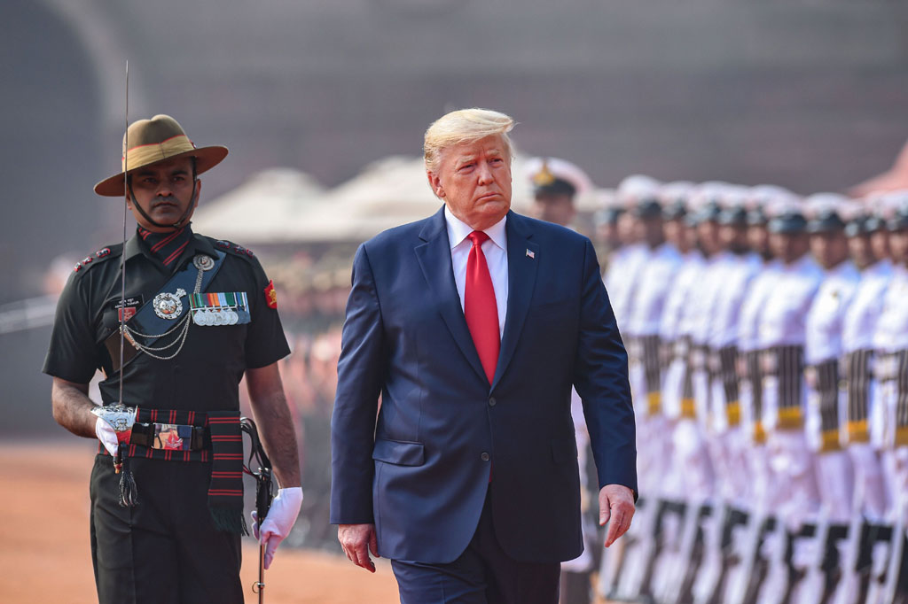 US President Donald Trump inspects a guard of honour during the ceremonial welcome at Rashtrapati Bhavan, in New Delhi